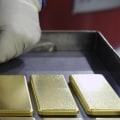 Does warren buffett invest in precious metals?